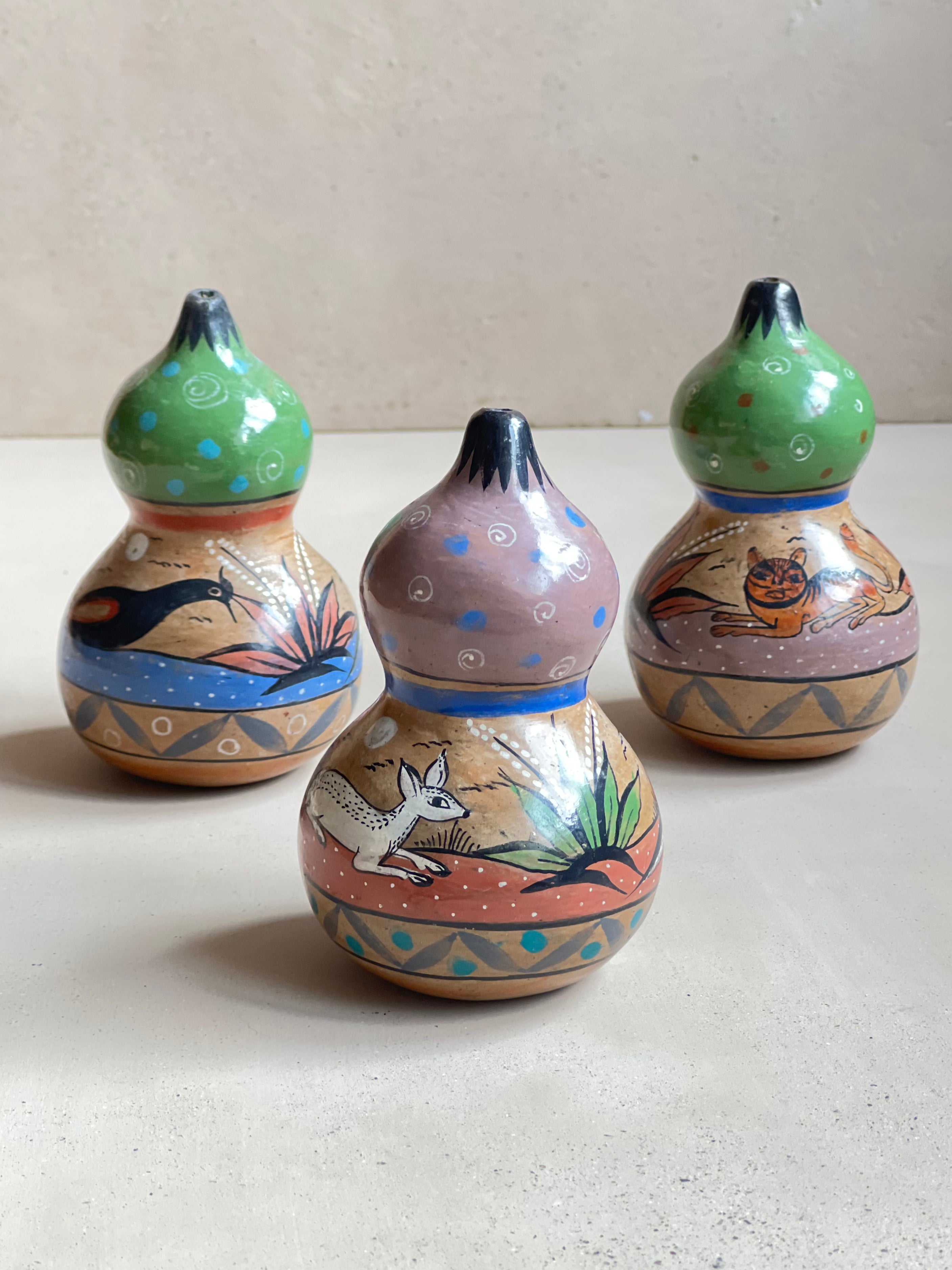 Decorative burnished clay gourds