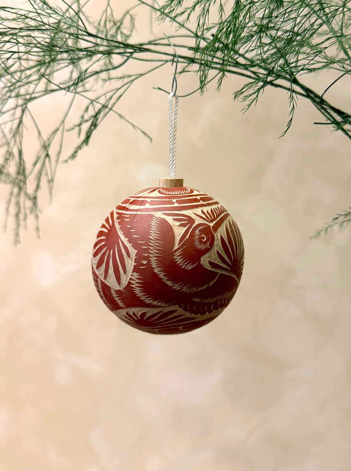Hand-carved jícara ornaments