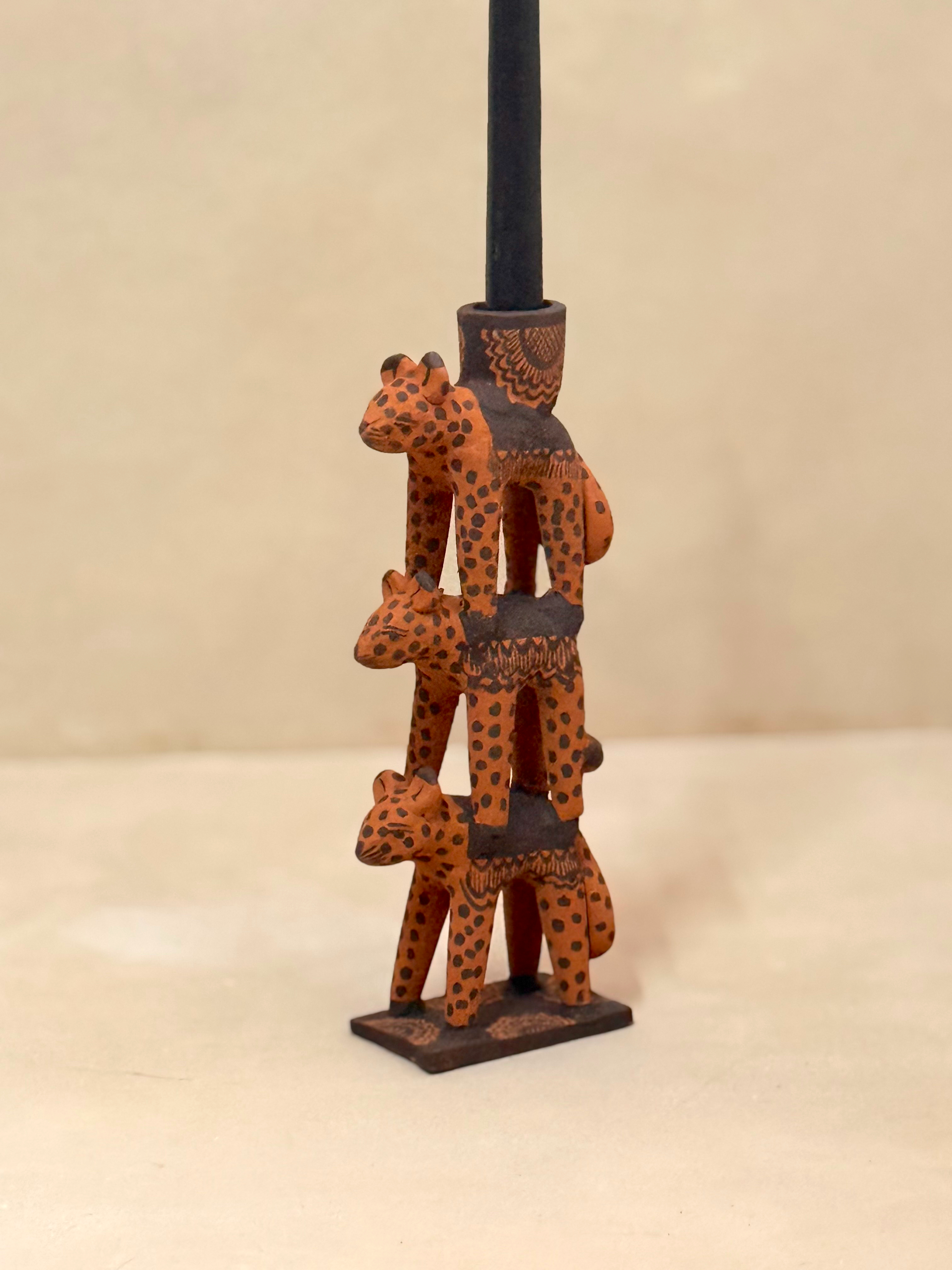 Candelabro torre de 3 animales