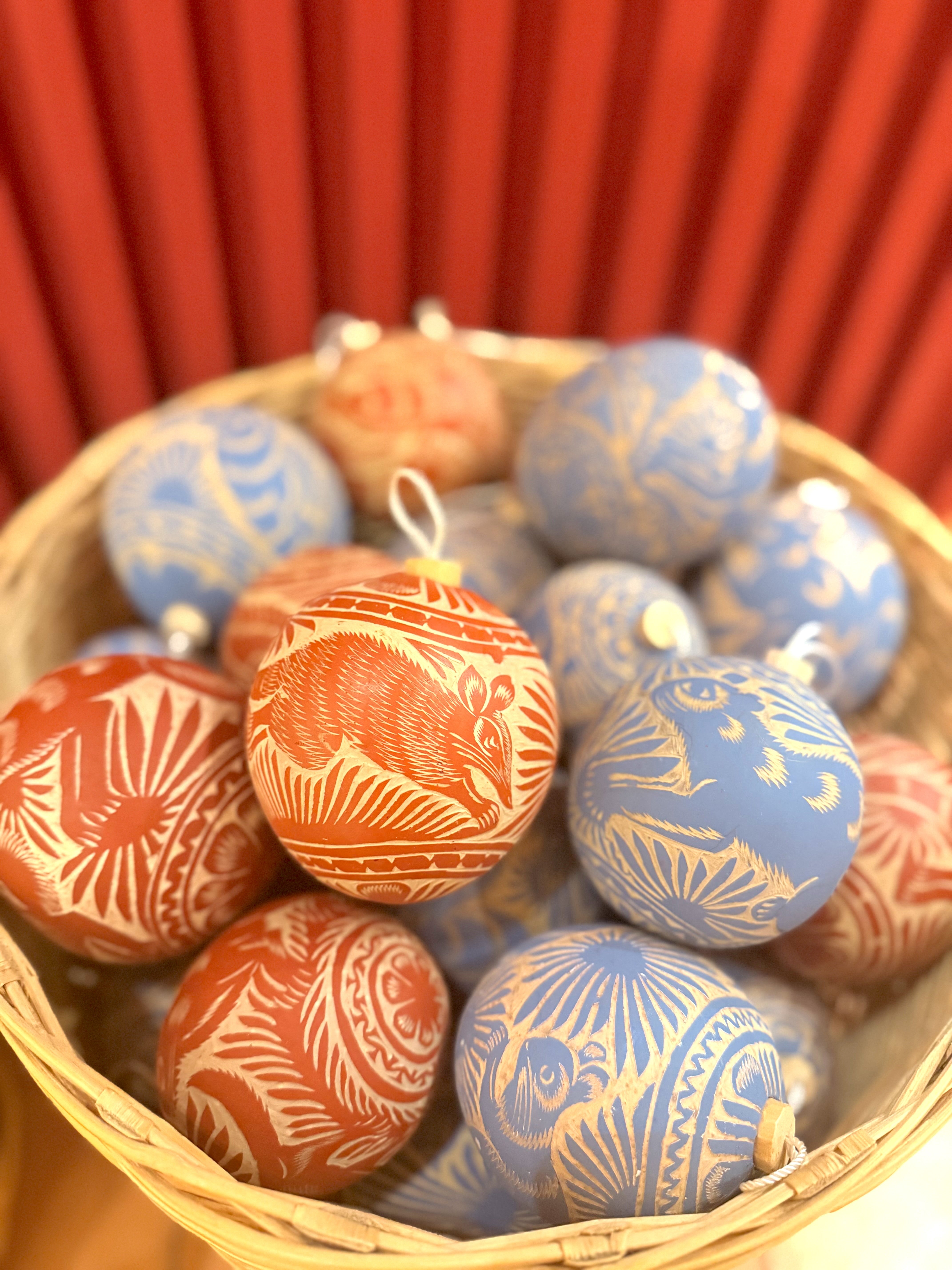 Hand-carved jícara ornaments